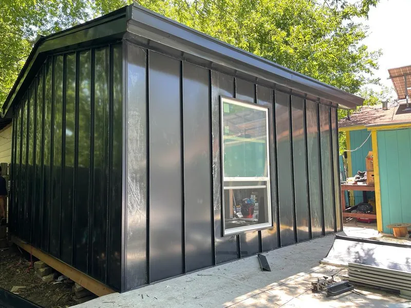 Black standing seam metal wall panels for Roof Inspection in Red Oak